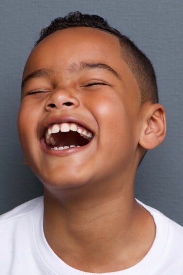 child laughing out loud LOL at best funny jokes for kids - Kids Activities blog