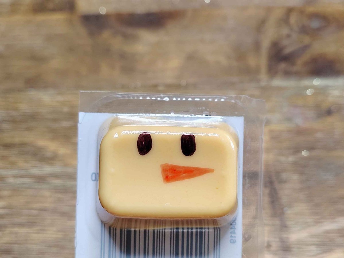 Christmas Snacks Craft- Step 2 - orange carrot nose- Kids Activities Blog