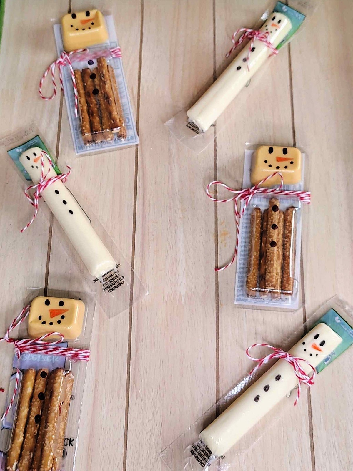 Christmas Snacks Craft- Finished with cheese sticks and dippers on wood board to look like snowman - Kids Activities Blog