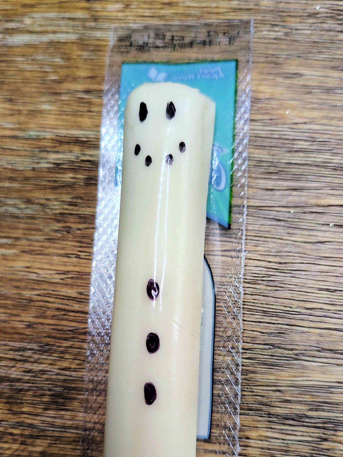 Christmas Snacks Craft- Step 8 - 3 buttons made with black marker - Kids Activities Blog