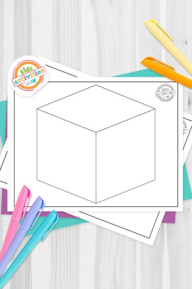 Black and white cube outline printables on top of blue-green and purple sheets with assorted markers on a dark grey background. printed pdf version from Kids activities blog.