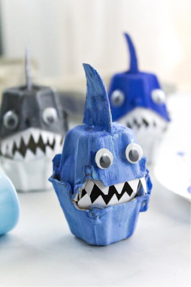blue and grey egg carton shark craft to make during shark week