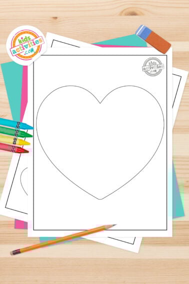 Set of black and white heart templates for kids, lying on top of a blue-green sheet with multicolored letters on a light brown background. printed pdf version from Kids activities blog.