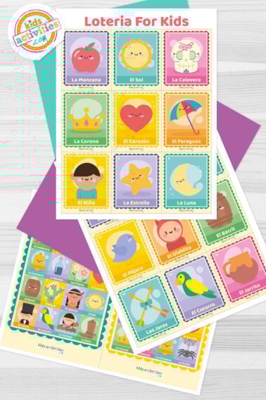 Three loteria cards stacked on top of each other with purple and green paper sheets in between, on top of a gray background