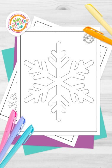 Set of black and white snowflake template pages for kids, on top of blue-green and purple sheets with assorted markers on a dark grey background. printed pdf version from Kids activities blog.