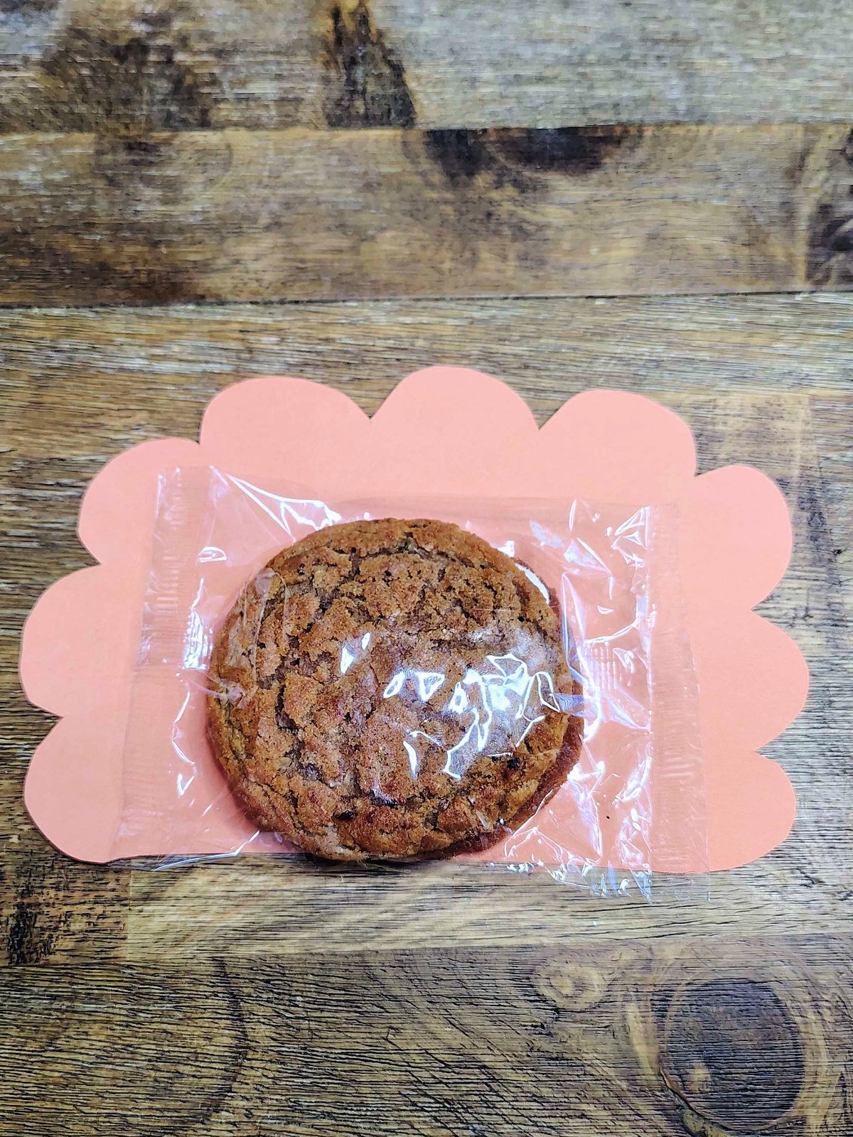 Turkey Craft- Step 2- Glue the orange feathers on the oatmeal cookie- Kids Activities Blog