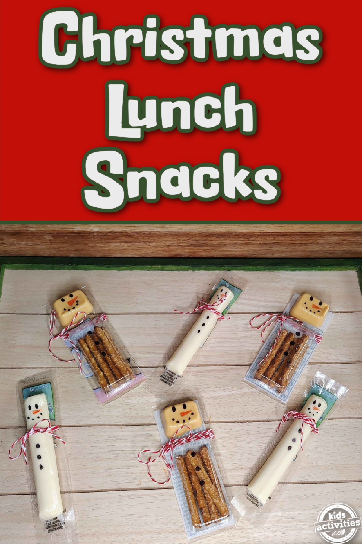Christmas Snacks- cheese sticks and pretzel dippers dressed like snowman- kids activities blog