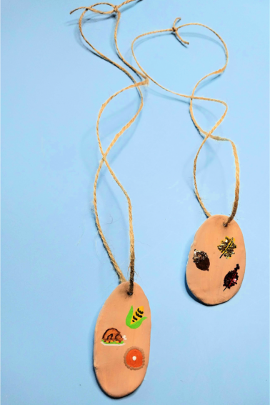 Homemade Necklace-thanksgiving and nature fall themed necklace on blue background - Kids Activities Blog